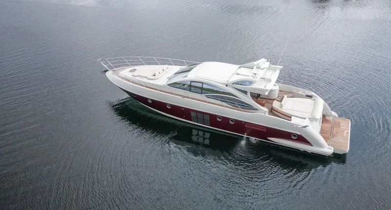  Yacht Photos Pics 2008 Azimut 62S yacht on calm water, showcasing sleek design and luxury features.