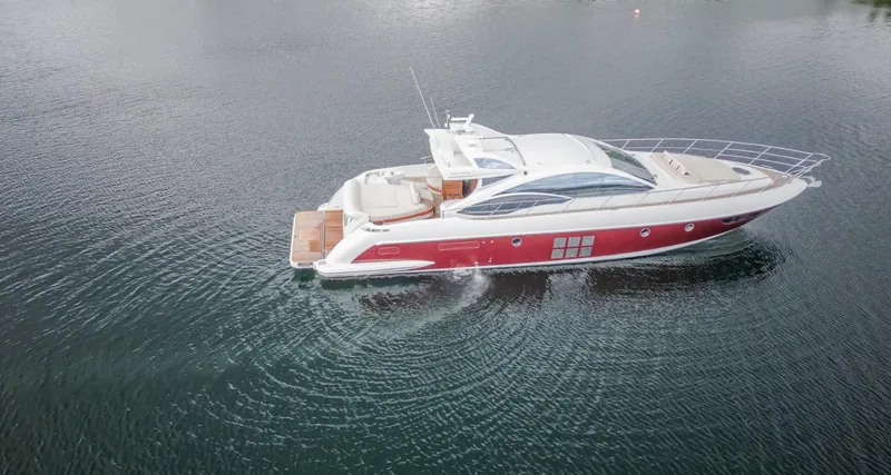  Yacht Photos Pics 2008 Azimut 62S yacht cruising on calm waters, showcasing sleek design and luxury features.