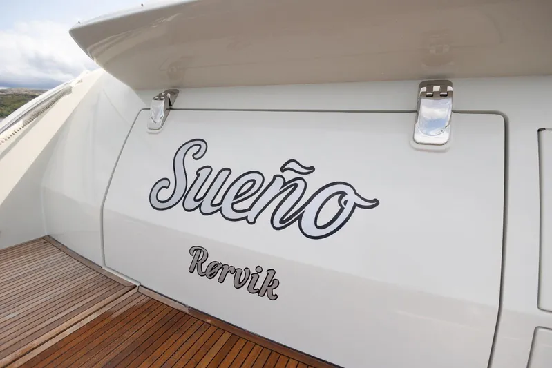  Yacht Photos Pics 2008 Azimut 62S yacht with "Sueño" name on the stern, wooden deck visible.