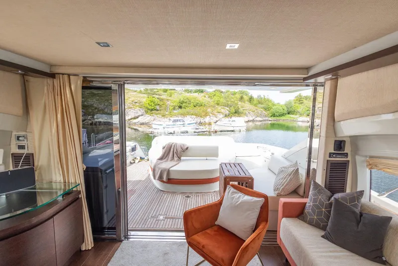  Yacht Photos Pics Luxurious 2008 Azimut 62S yacht interior with elegant seating and scenic water view.