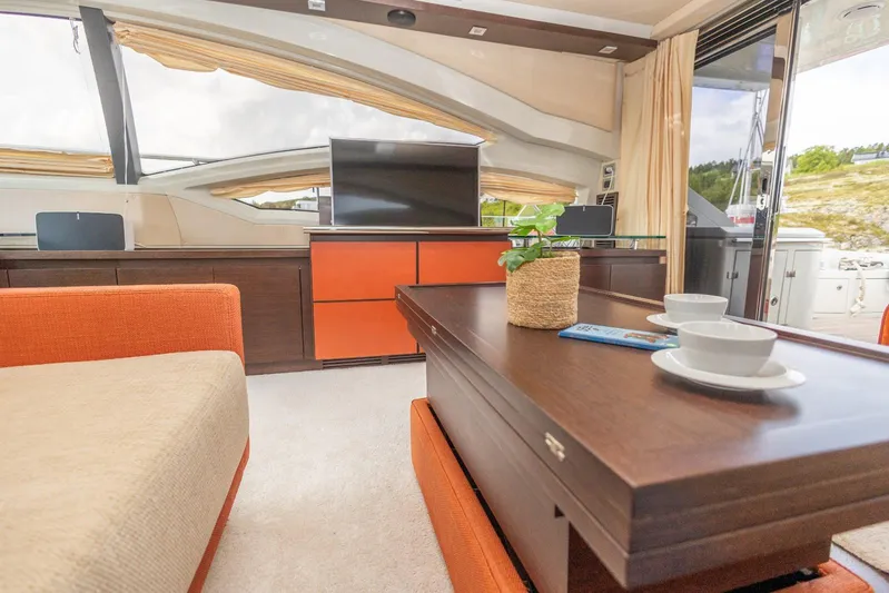  Yacht Photos Pics Luxurious interior of 2008 Azimut 62S yacht with modern furnishings and elegant decor.