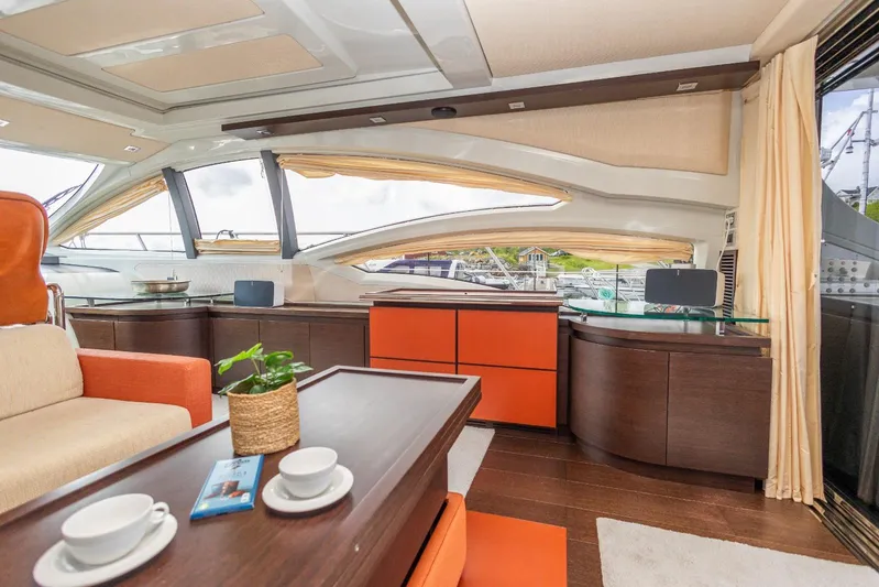  Yacht Photos Pics Luxurious interior of 2008 Azimut 62S yacht with modern furnishings and panoramic windows.