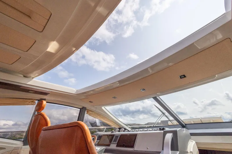  Yacht Photos Pics Interior view of 2008 Azimut 62S yacht with sunroof and leather seating.