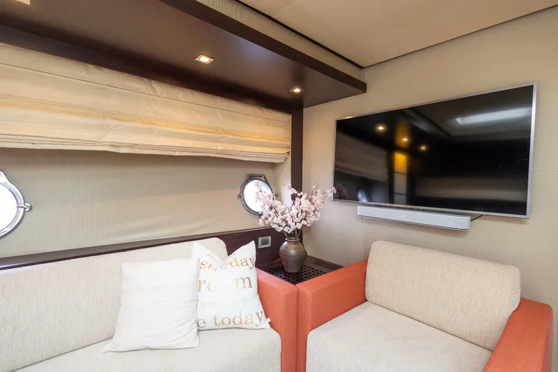  Yacht Photos Pics Luxurious interior of 2008 Azimut 62S yacht with modern decor and flat-screen TV.