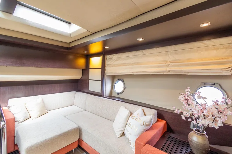  Yacht Photos Pics Luxurious interior of 2008 Azimut 62S yacht with cozy seating and elegant decor.