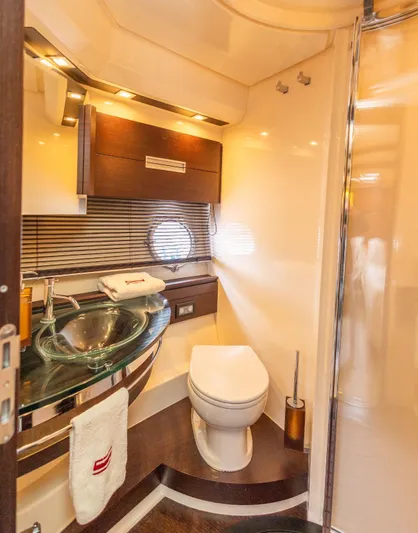  Yacht Photos Pics Luxurious bathroom interior of 2008 Azimut 62S yacht with modern fixtures and elegant design.