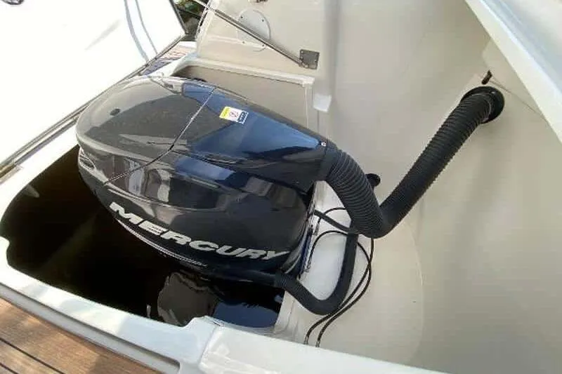  Yacht Photos Pics 2013 Searay 370 Venture boat engine compartment with Mercury outboard motor.