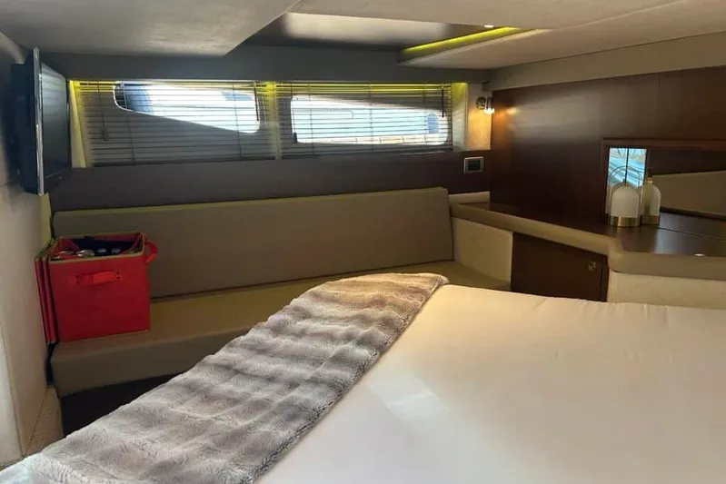  Yacht Photos Pics 2013 Searay 370 Venture cabin interior with bed, sofa, and windows.