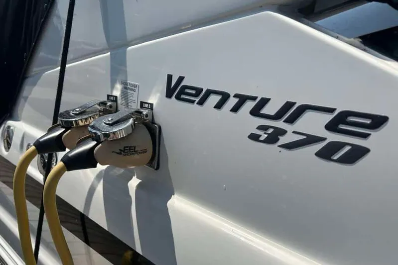  Yacht Photos Pics 2013 Searay 370 Venture boat with power connections and branding.