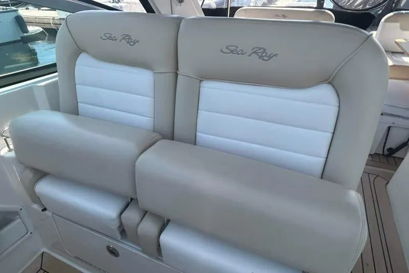  Yacht Photos Pics 2013 Searay 370 Venture boat seats with beige and white upholstery.