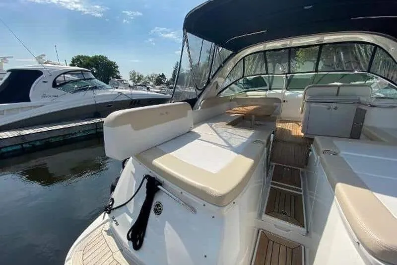  Yacht Photos Pics 2013 Searay 370 Venture yacht with spacious deck and seating, docked at marina.