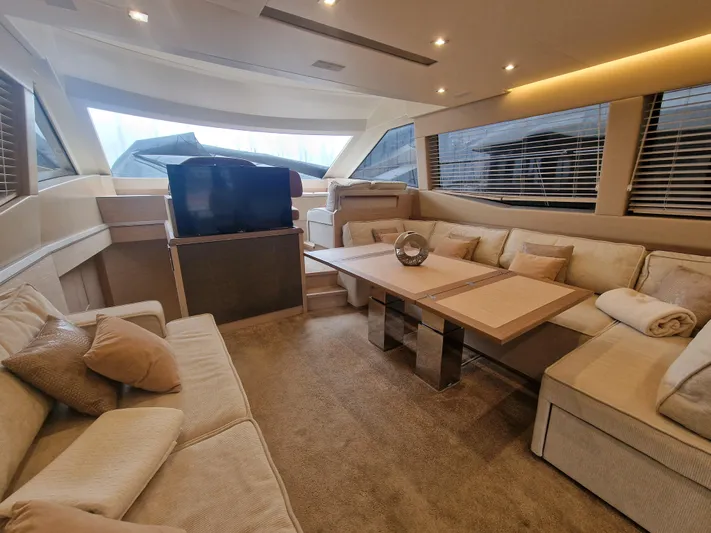Sandrali Yacht Photos Pics Luxurious interior of 2016 Beneteau Monte Carlo 6 yacht with plush seating and elegant decor.