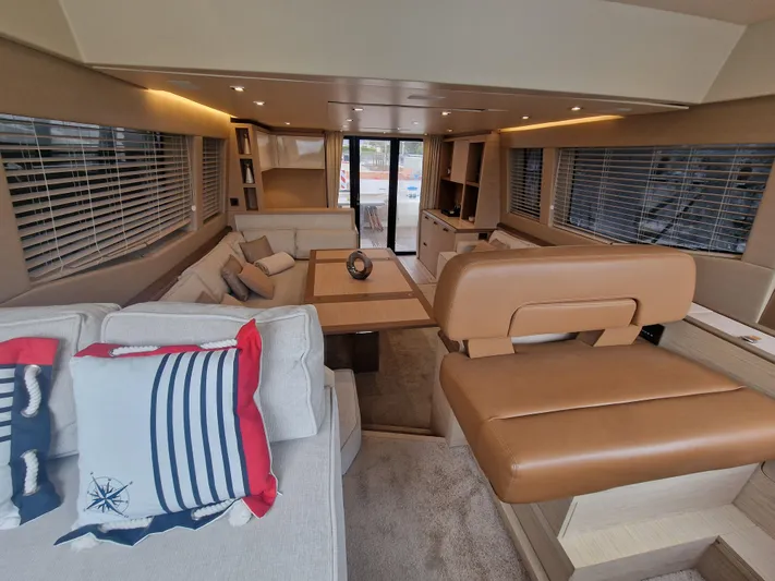 Sandrali Yacht Photos Pics Luxurious interior of 2016 Beneteau Monte Carlo 6 yacht with elegant seating and decor.