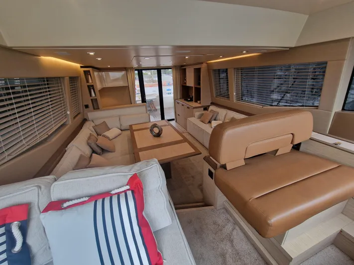 Sandrali Yacht Photos Pics Luxurious interior of 2016 Beneteau Monte Carlo 6 yacht with elegant seating and modern design.
