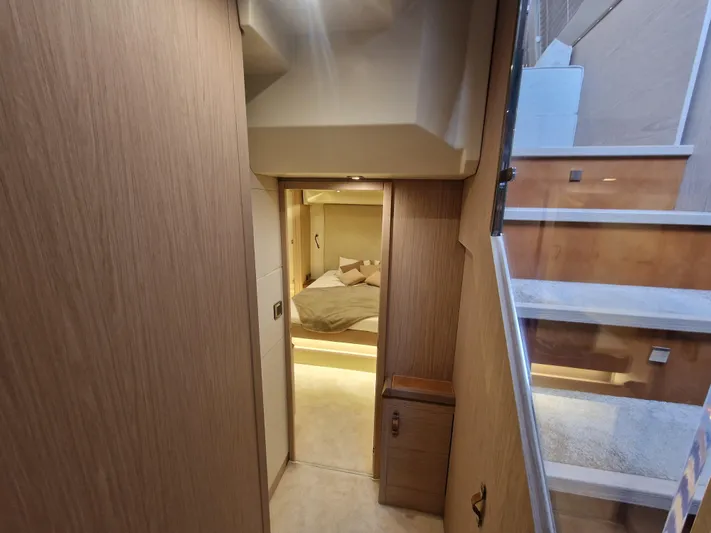 Sandrali Yacht Photos Pics Interior of 2016 Beneteau Monte Carlo 6 yacht, featuring a cozy bedroom and modern design.