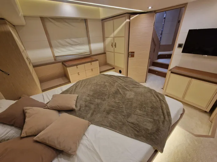 Sandrali Yacht Photos Pics Luxurious bedroom interior of 2016 Beneteau Monte Carlo 6 yacht with modern furnishings.