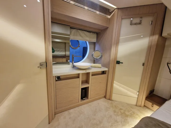 Sandrali Yacht Photos Pics Luxurious bathroom interior of 2016 Beneteau Monte Carlo 6 yacht with modern fixtures.