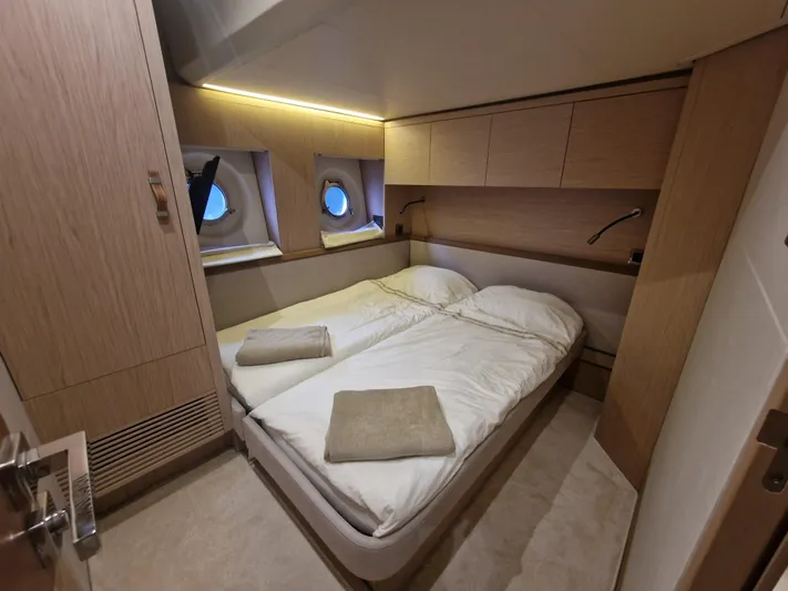 Sandrali Yacht Photos Pics Luxurious cabin interior of 2016 Beneteau Monte Carlo 6 yacht with twin beds.