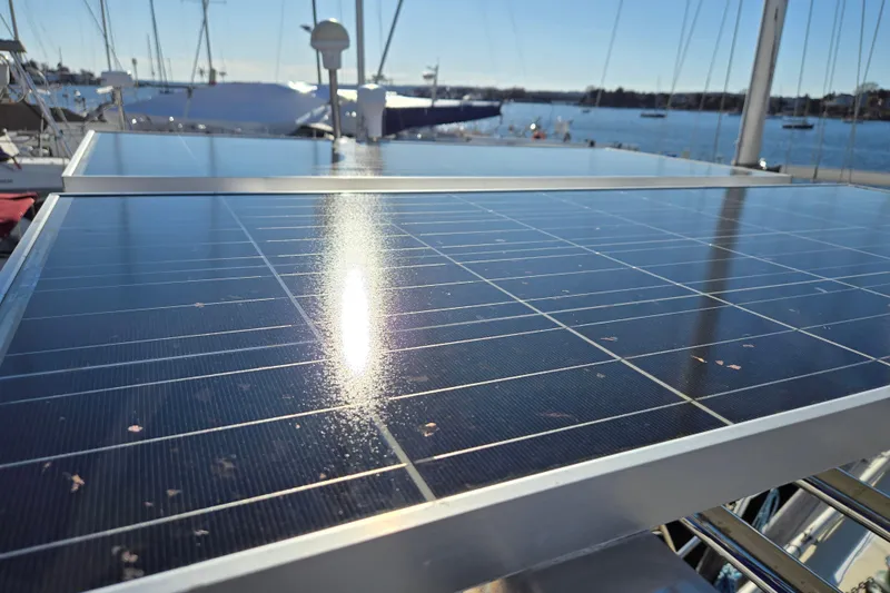 Luthien Yacht Photos Pics Solar panels on Jeanneau Sun Odyssey 42 Center Cockpit, 1998 model.