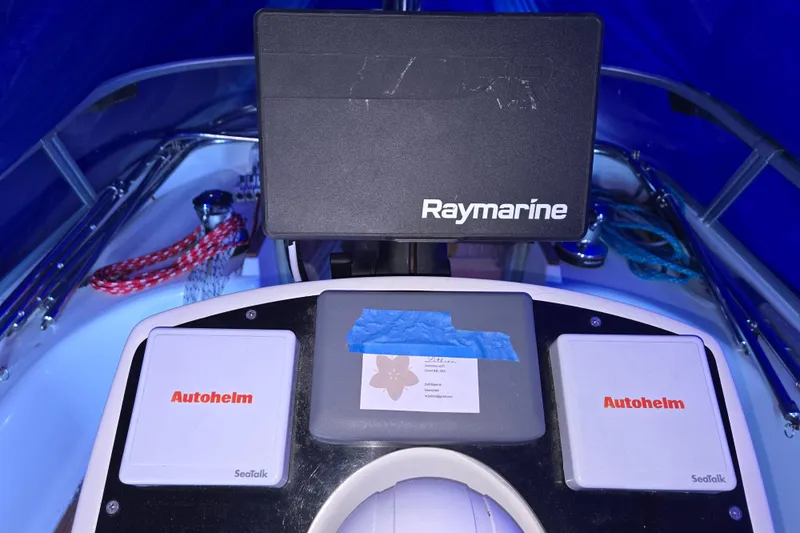 Luthien Yacht Photos Pics Jeanneau Sun Odyssey 42 cockpit with Raymarine and Autopilot systems.