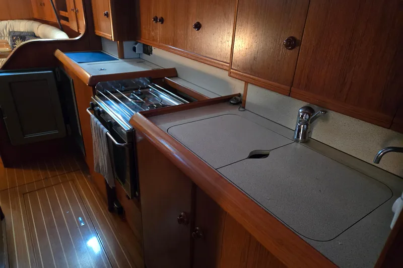 Luthien Yacht Photos Pics Galley of Jeanneau Sun Odyssey 42 Center Cockpit, 1998 model.