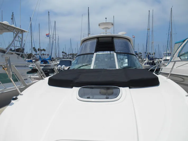 Legasea Yacht Photos Pics 2013 Sea Ray 330 Sundancer yacht docked in marina, front view.