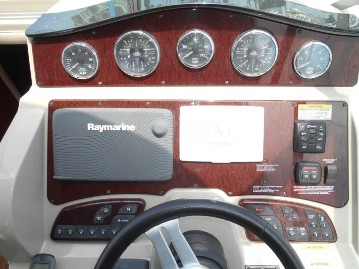 Legasea Yacht Photos Pics Dashboard of 2013 Sea Ray 330 Sundancer with Raymarine navigation system.