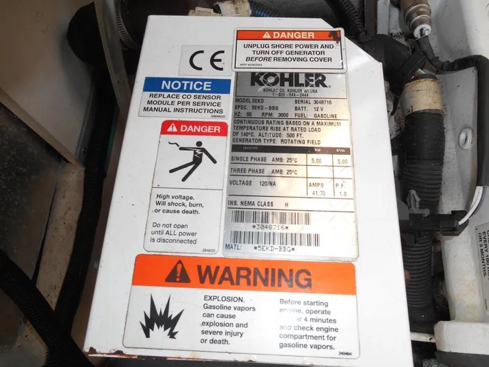 Legasea Yacht Photos Pics Kohler generator warning labels on a 2013 Sea Ray 330 Sundancer boat.
