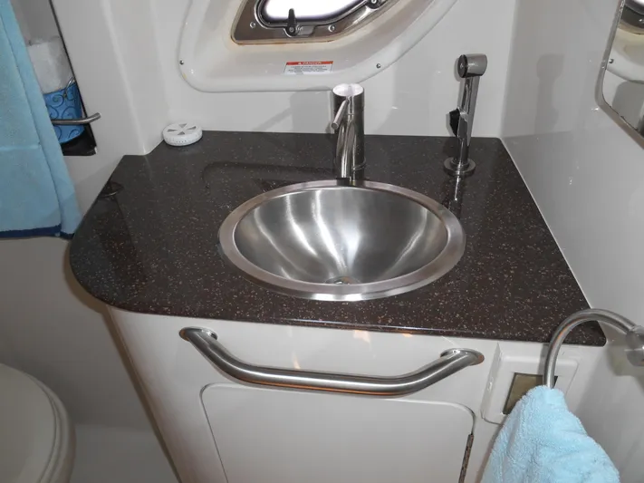 Legasea Yacht Photos Pics Stainless steel sink in 2013 Sea Ray 330 Sundancer bathroom.