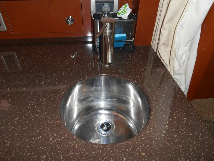 Legasea Yacht Photos Pics Stainless steel sink on 2013 Sea Ray 330 Sundancer yacht kitchen counter.