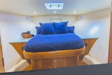Oyster Yacht Photos Pics Luxurious bedroom interior of 2012 Custom Carolina Ritchie Howell 60 Sportfish yacht.