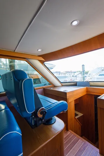 Oyster Yacht Photos Pics Interior of 2012 Custom Carolina Ritchie Howell 60 Sportfish yacht with blue seating.