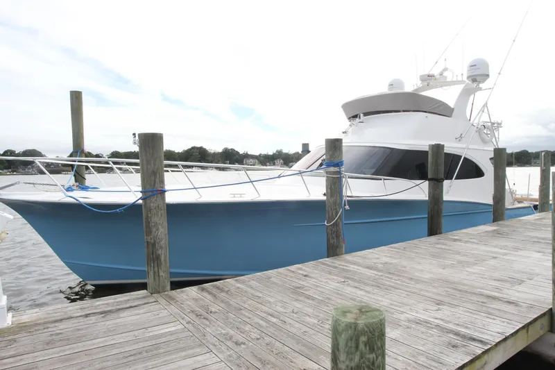 Oyster Yacht Photos Pics 2012 Custom Carolina Ritchie Howell 60 Sportfish yacht docked at marina.
