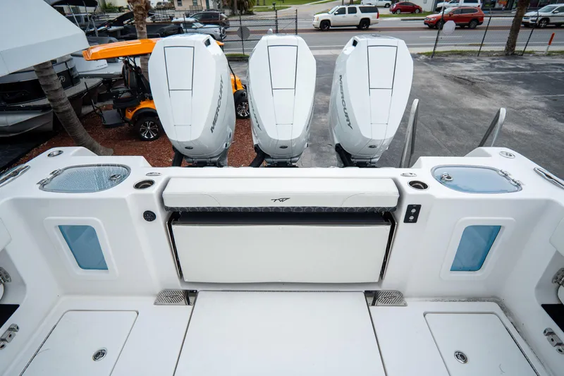  Yacht Photos Pics 2023 Tidewater 380 CC Adventure boat with triple Mercury outboard engines.