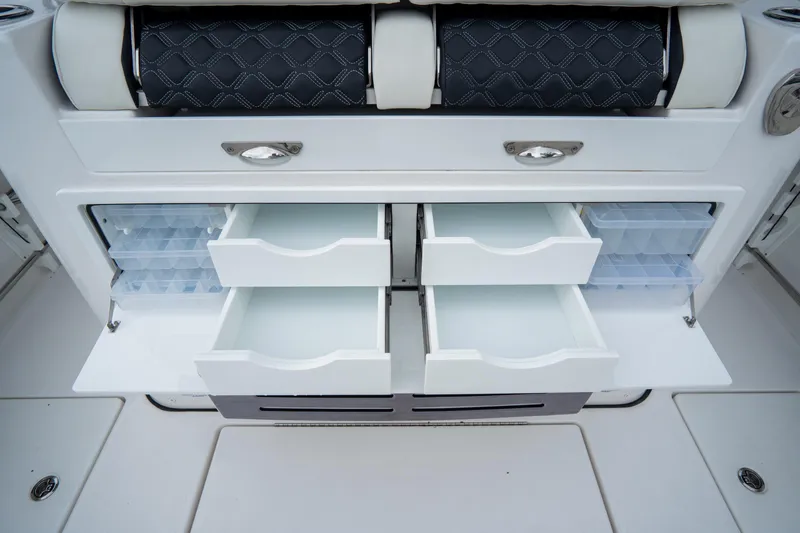  Yacht Photos Pics 2023 Tidewater 380 CC Adventure boat storage drawers and compartments.