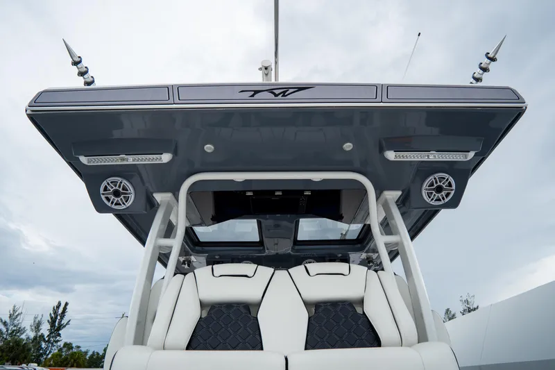  Yacht Photos Pics 2023 Tidewater 380 CC Adventure boat, featuring sleek design and advanced audio system.