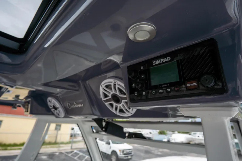  Yacht Photos Pics 2023 Tidewater 380 CC Adventure boat console with Simrad electronics and speakers.