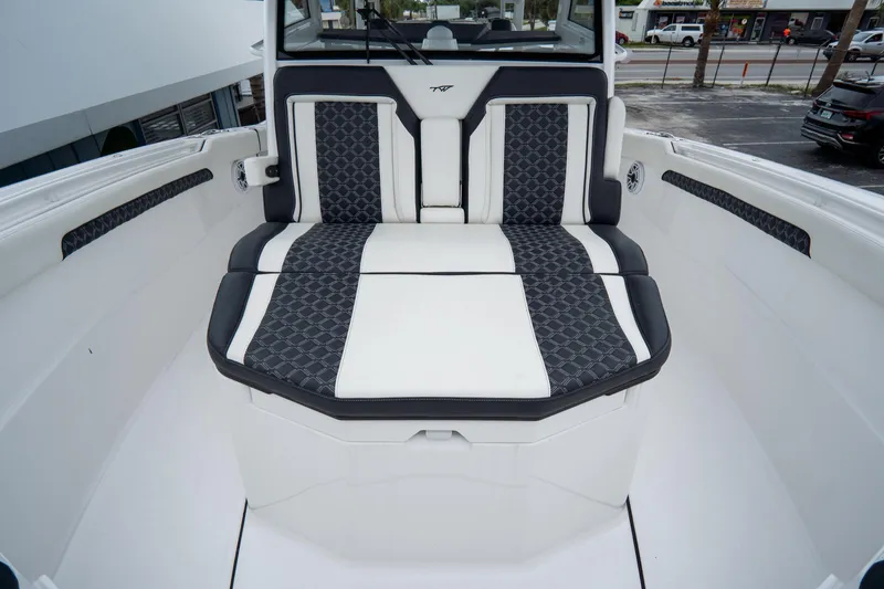  Yacht Photos Pics 2023 Tidewater 380 CC Adventure boat interior with stylish seating and modern design.