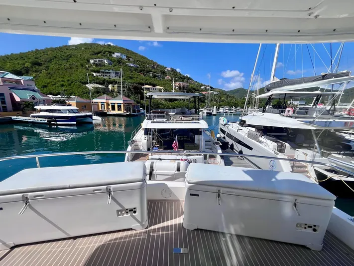 Ida Cat Yacht Photos Pics Leopard 51 Powercat 2017 docked in scenic marina with lush green hills.