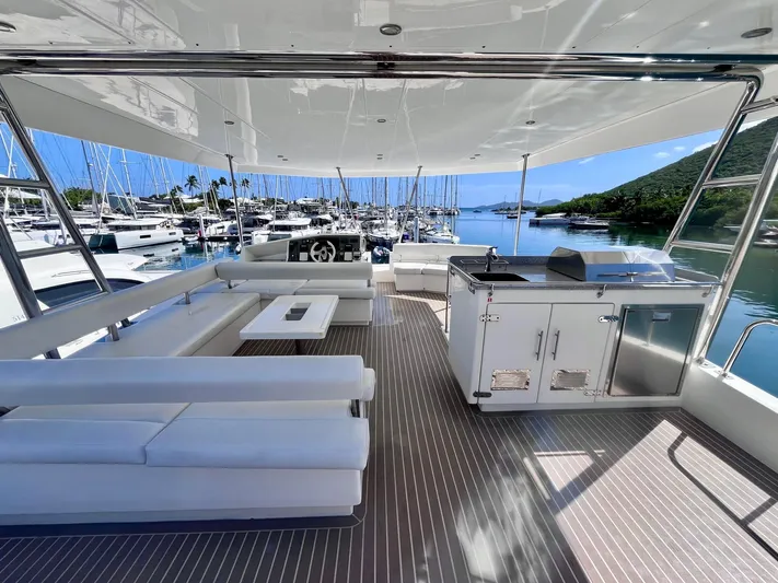 Ida Cat Yacht Photos Pics Spacious deck of 2017 Leopard 51 Powercat with marina view and luxurious seating.