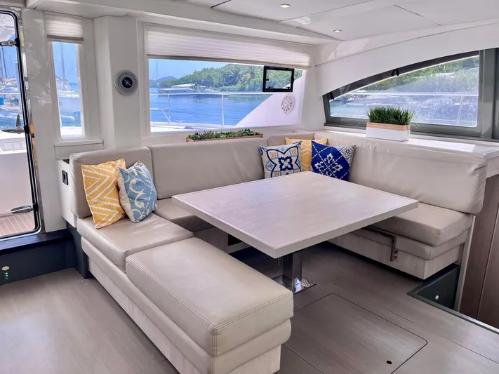 Ida Cat Yacht Photos Pics Luxurious interior of 2017 Leopard 51 Powercat with elegant seating and scenic window views.