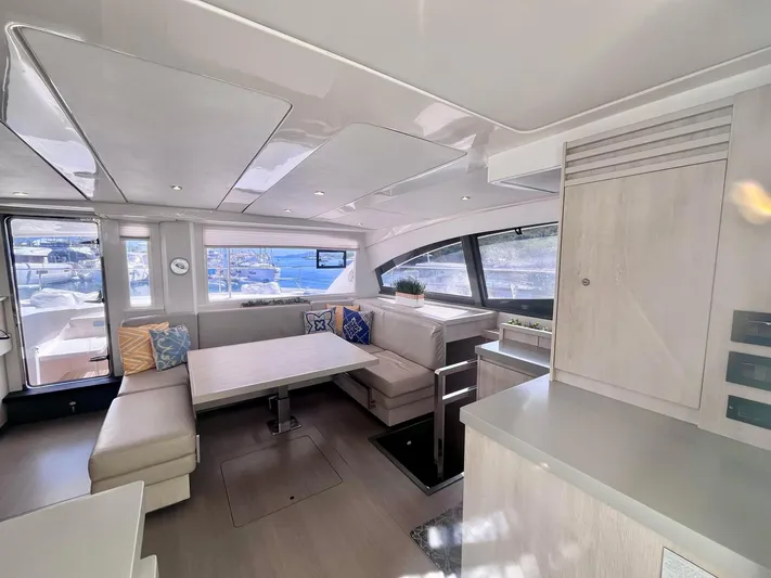 Ida Cat Yacht Photos Pics Interior of 2017 Leopard 51 Powercat with modern seating and large windows.