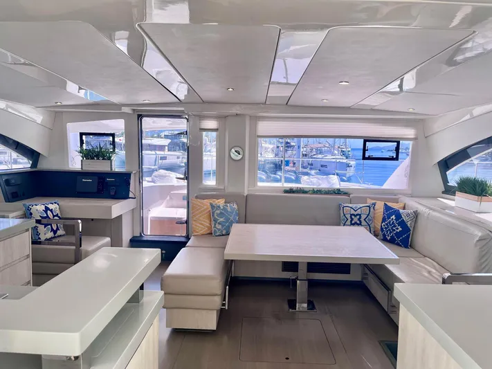 Ida Cat Yacht Photos Pics Luxurious interior of 2017 Leopard 51 Powercat yacht with modern seating and decor.