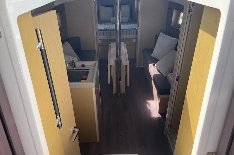 Dulce Vida Yacht Photos Pics Interior of 2022 Beneteau Oceanis 35.1 yacht, featuring cozy seating and modern design.
