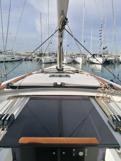  Yacht Photos Pics 2019 Dufour 460 Grand Large sailboat deck view in marina.