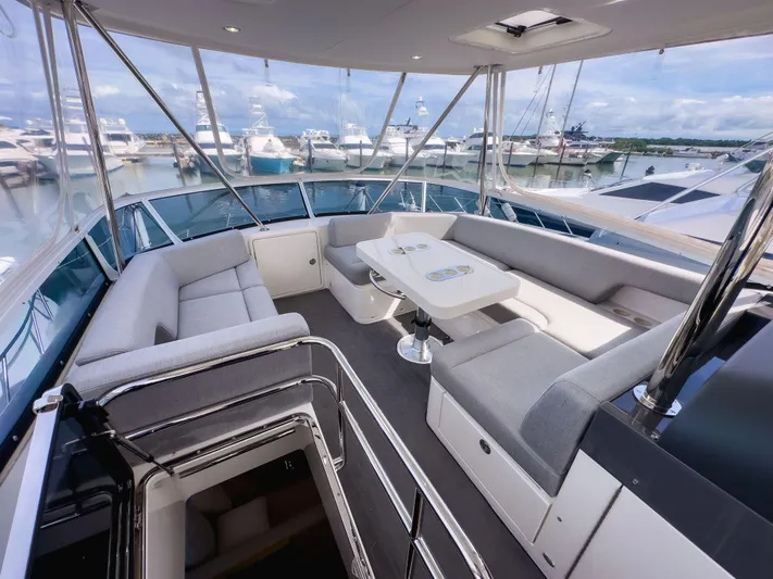  Yacht Photos Pics Luxurious 2024 Riviera SMY 46 yacht interior with spacious seating and elegant design.