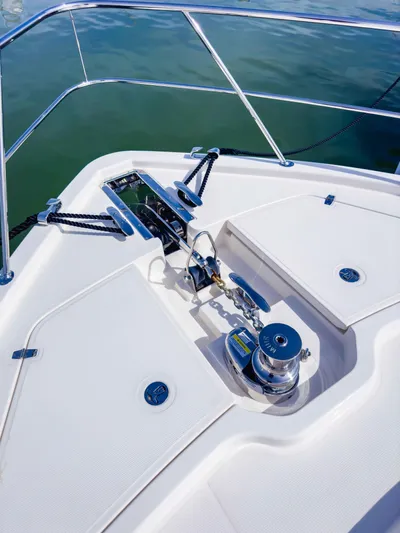  Yacht Photos Pics 2024 Riviera SMY 46 yacht deck with anchor system and chrome fittings.