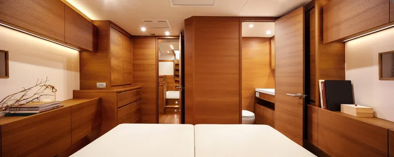  Yacht Photos Pics Luxurious interior of 2019 Solaris 64RS yacht with elegant wooden furnishings.
