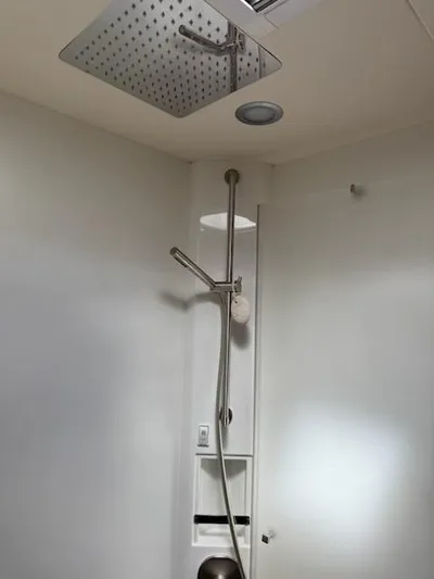  Yacht Photos Pics Modern shower in 2019 Solaris 64RS yacht with sleek fixtures and minimalist design.