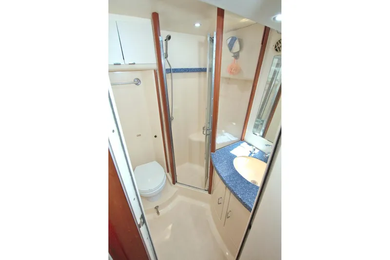Fish Daddy Yacht Photos Pics Bathroom interior of 1998 Luhrs 36 Convertible yacht with shower and sink.